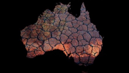 An artistic depiction of a satellite image of the whole of Australia covered in dry, cracked earth