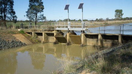 FlumeGate Irrigation water flow regulator and control gates that are remotely controlled and solar powered