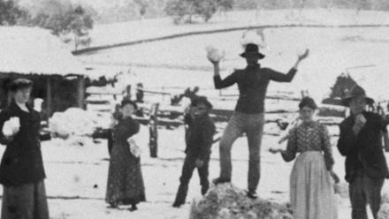 A vintage black and white photo of people enjoying snow in Australia.