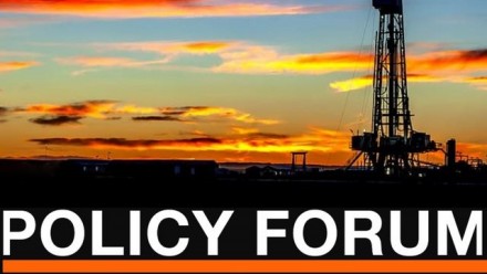 The sun sets behind the silhouette of an oil rig, with the 'Policy Forum' title in large white font at the bottom, and the ANU Asia and The Pacific Policy Society name and logo in the top lefthand corner.