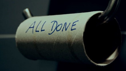 An empty toilet roll, with the words 'all done' written on it.