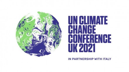 The logo for the UN Climate Change Conference UK 2021, with an artistic depiction of the globe on the left-hand side, with the green representing the land, the blue representing the sea, and the white representing the clouds all swirling together.