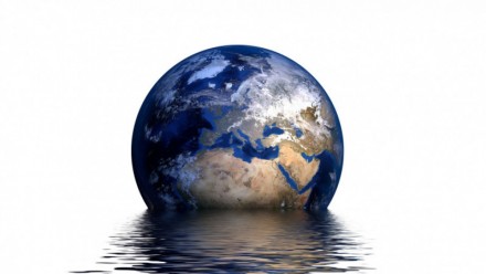 An artistic depiction of a globe being flooded by water.