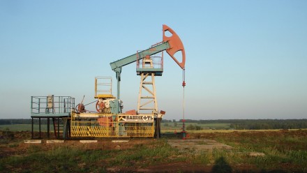 A photograph of an oil reserve in a field in Russia