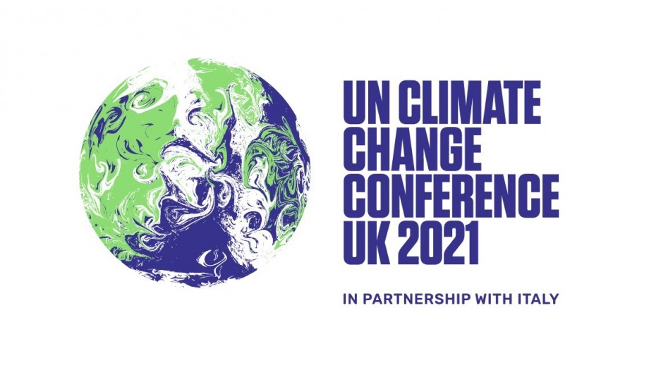 The official COP26 logo - with an artistic depiction of the globe (a sphere of dark blue, green and white swirling together), and the words 'UN Climate Change Conference UK 2021 - in partnership with Italy' on the right in blue font.