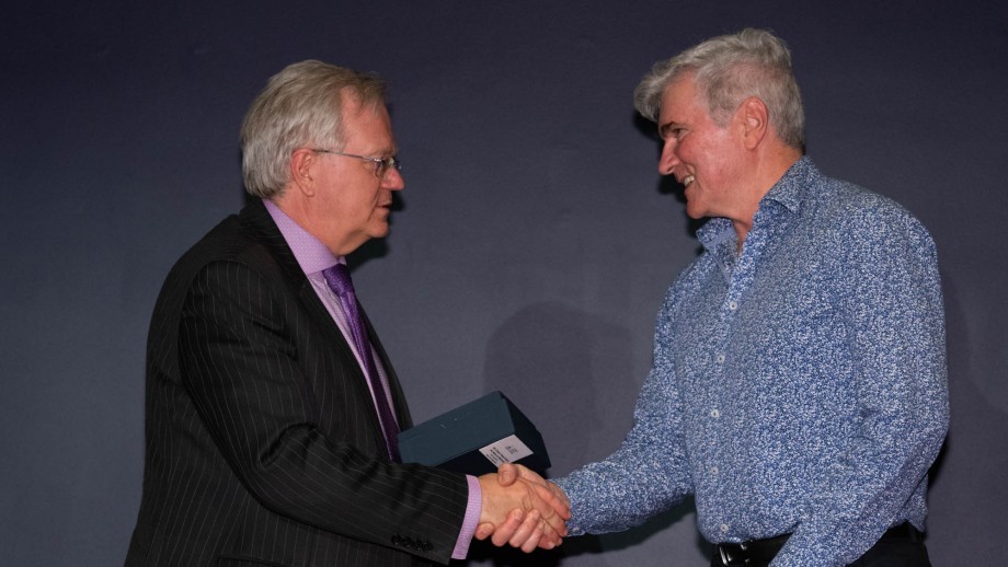 Professor Brian Schmidt, ANU Vice Chancellor, presenting an award to Professor Mark Howden