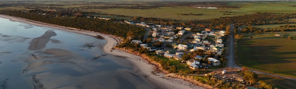 Dany Beach, Corny Point, Yorke Peninsula, South Australia: Aerial View of Coastal Town, Sandy Shoreline, and Scenic Ocean Views at Sunset