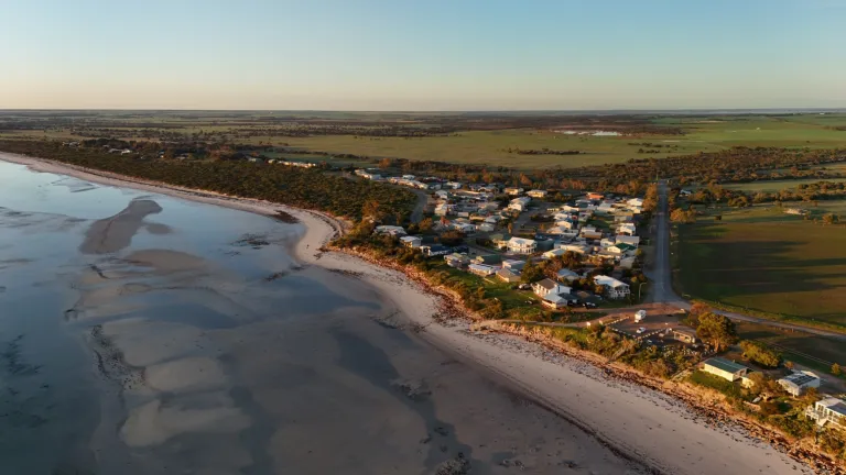 Dany Beach, Corny Point, Yorke Peninsula, South Australia: Aerial View of Coastal Town, Sandy Shoreline, and Scenic Ocean Views at Sunset